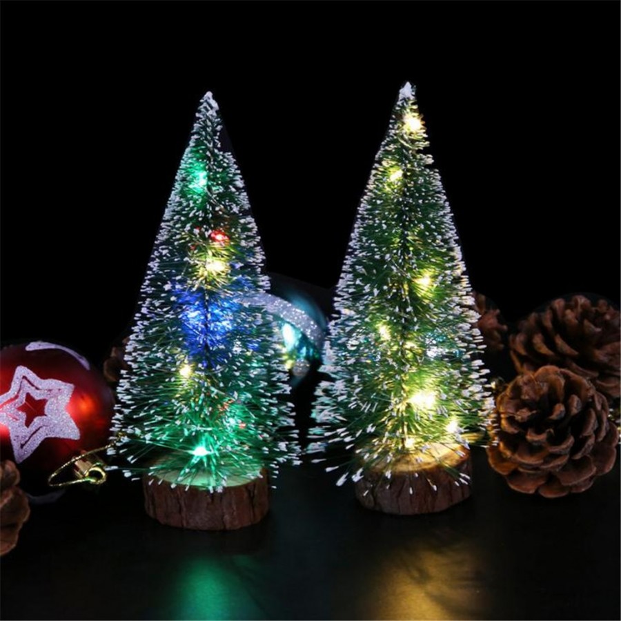 Mini brad decorativ realizat din plastic pentru Craciun cu suport lemn,20 cm - Brazi -wowreduceri.ro Mini brad decorativ realizat din plastic pentru Craciun cu suport lemn,20 cm ( Brazi )